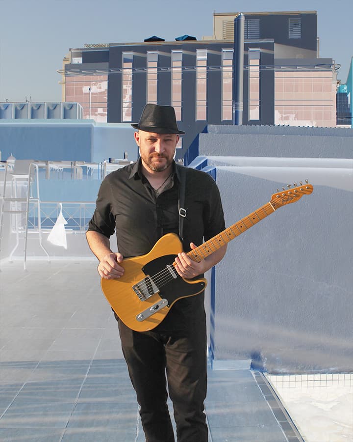 Dubai Guitarist singer in black with yellow Telecaster
