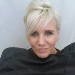 Rachael Calladine with blonde hair and a black top